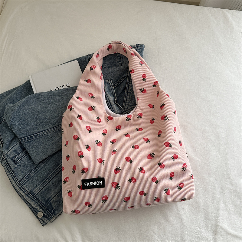 Bolso de meandruño 2024 nuevo hombro de gran capacidad bolso de mano de transporte literario versátil impresión brazaleta