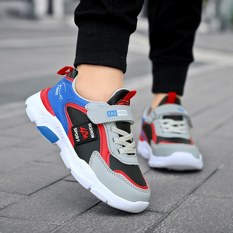 Спортивная обувь для мальчиков, весенне-осенняя детская обувь для учащихся начальной школы, водонепроницаемая повседневная обувь на мягкой подошве, кроссовки среднего и большого размера с кожаным покрытием.