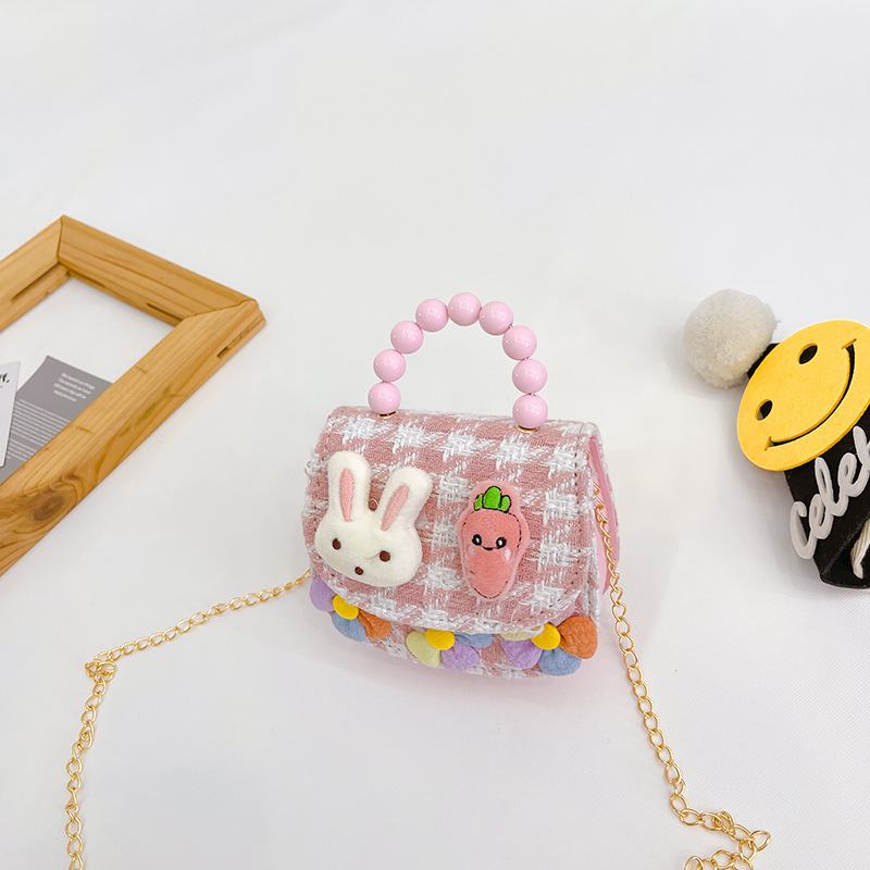 2022 nuevos niños bolso de hombro crossbody Chanel estilo niñas bolsa perla portátil accesorios de dibujos animados bolsa de desgaste