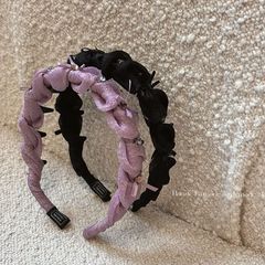 ドリルの蝶結びの糸のしわはカチューシャを巻いて歯の滑り止めを持って顔を見せます。