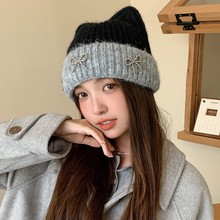 2025年秋冬季时尚拼色珍珠蝴蝶结毛线帽子女韩版百搭保暖针织帽子