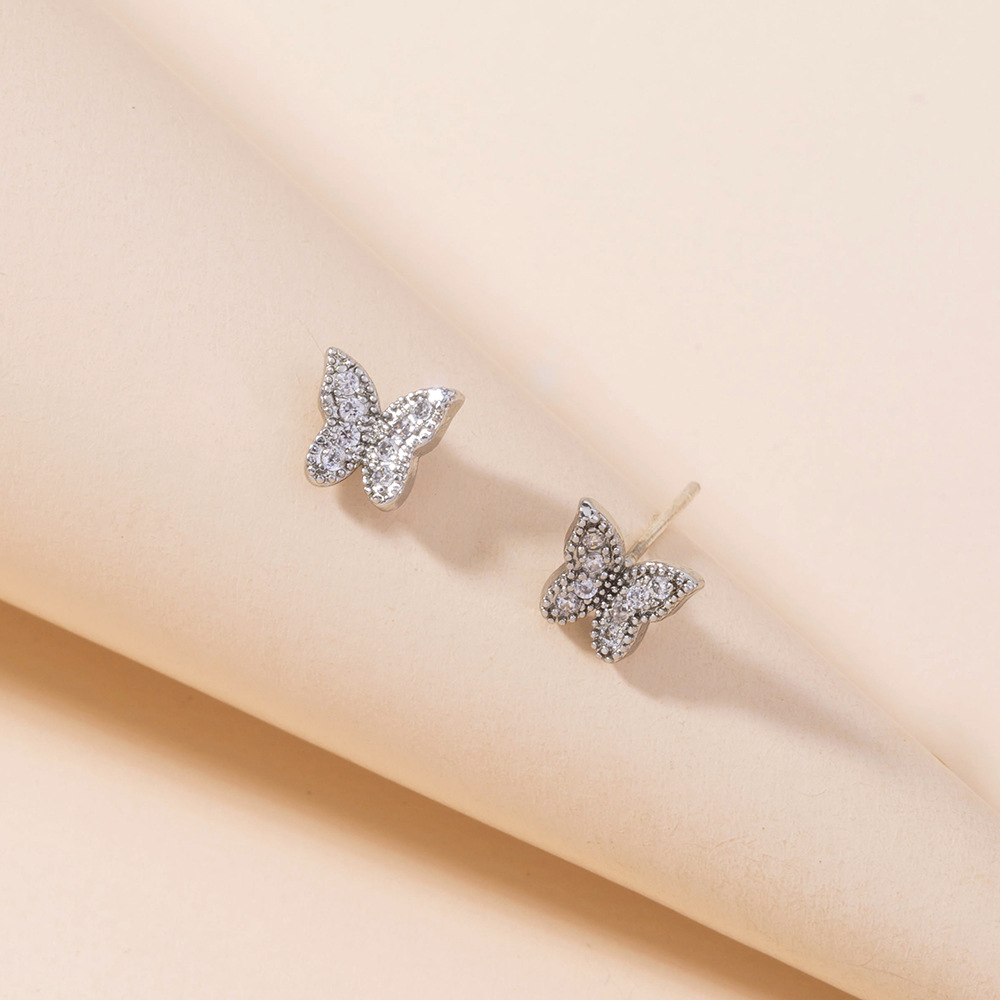 Simple Retro Micro-inlaid Zircon Mini Butterfly Animal Shape Small Copper Stud Earrings display picture 3