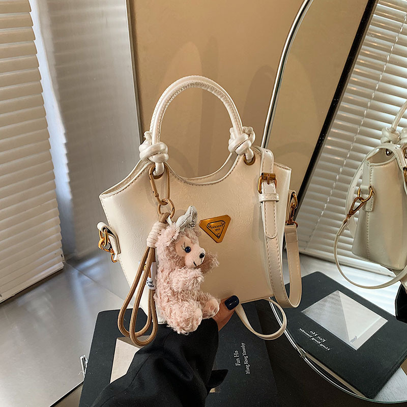 Bolsa de cubo de moda coreana retro primavera y verano nueva moda bolso de hombro de estilo de moda para trabajar textura personalidad mochila