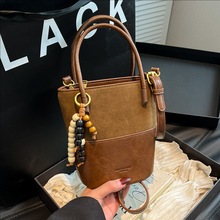 韩国麂皮绒双拼撞色水桶包女2025新款时尚百搭斜挎包单肩腋下包