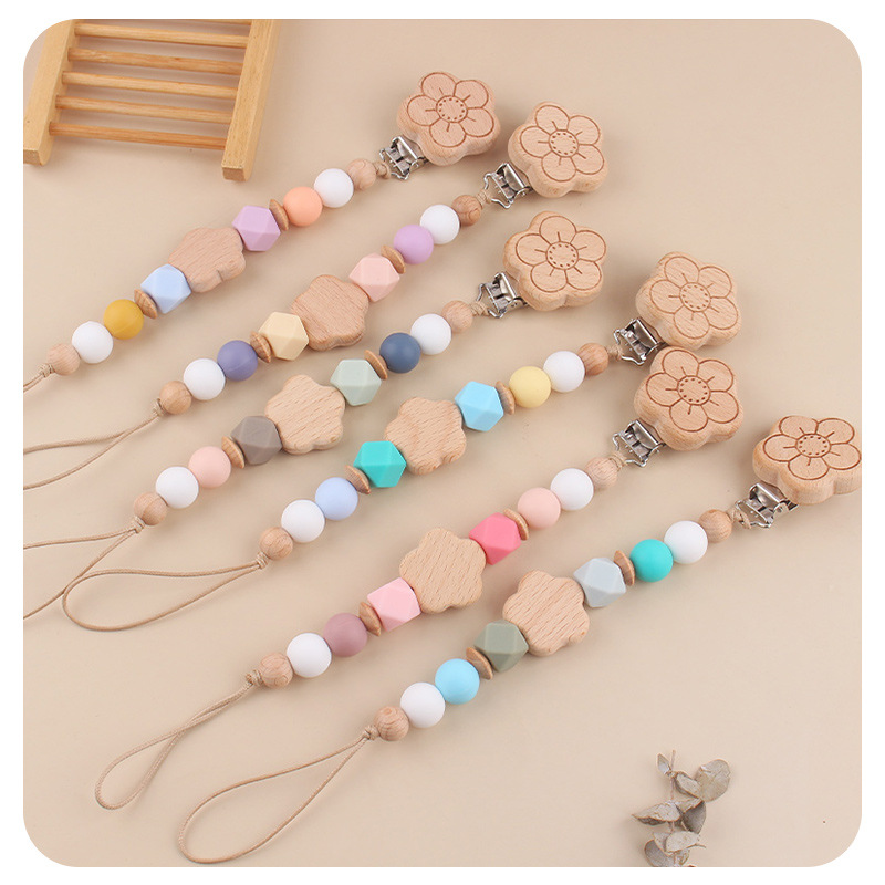 Productos para bebés flores de beech chupeta clips de dibujos animados para bebés flores de beech mordida de dientes molares chupeta cadena de prevención