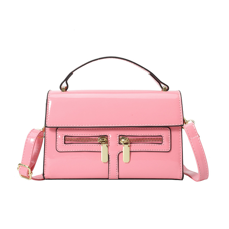 Bolso de diseño de nicho 2025 verano nuevo bolso femenino de alta calidad textura bolso de hombro charol brillante bolso de mensajero marea