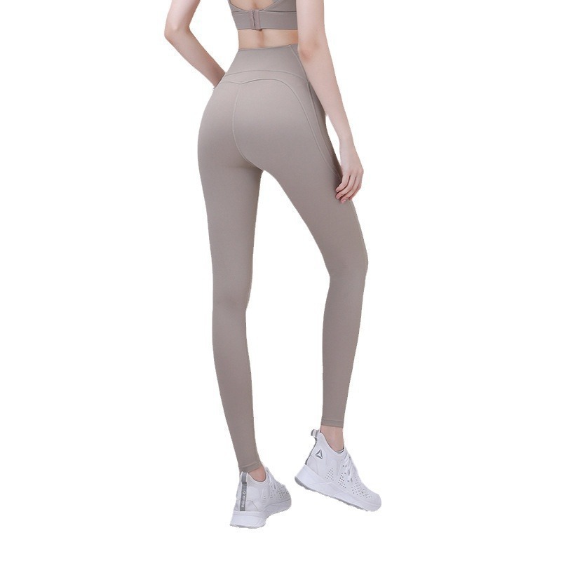 Nuevos pantalones de yoga de verano para mujer, pantalones deportivos de primavera de cintura alta, ajustados, de alta elasticidad, profesionales, para fitness y uso al aire libre.