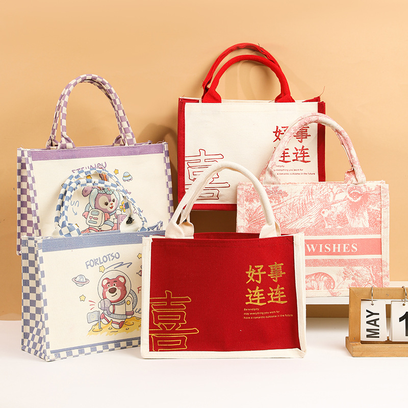 结婚婚礼伴娘伴手礼手提袋儿童生日满月周岁礼袋婚庆喜糖布袋批发
