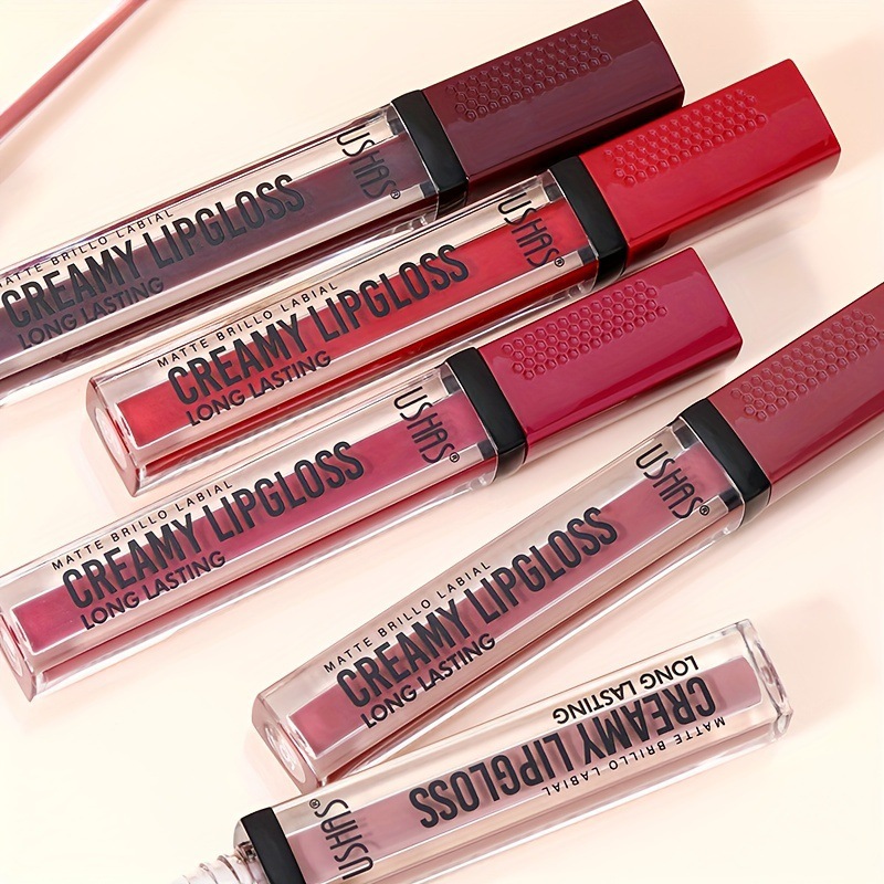 USHAS Europa y los Estados Unidos transfronterizos spot lipstick no se desvanece no pegajoso taza lipstick esmalte labial color duradero LG2523A