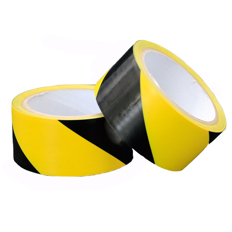 Los fabricantes suministran cinta de advertencia negra y amarilla al por mayor, cinta de marcado de suelo tipo cebra, cinta de advertencia de PVC al por mayor.