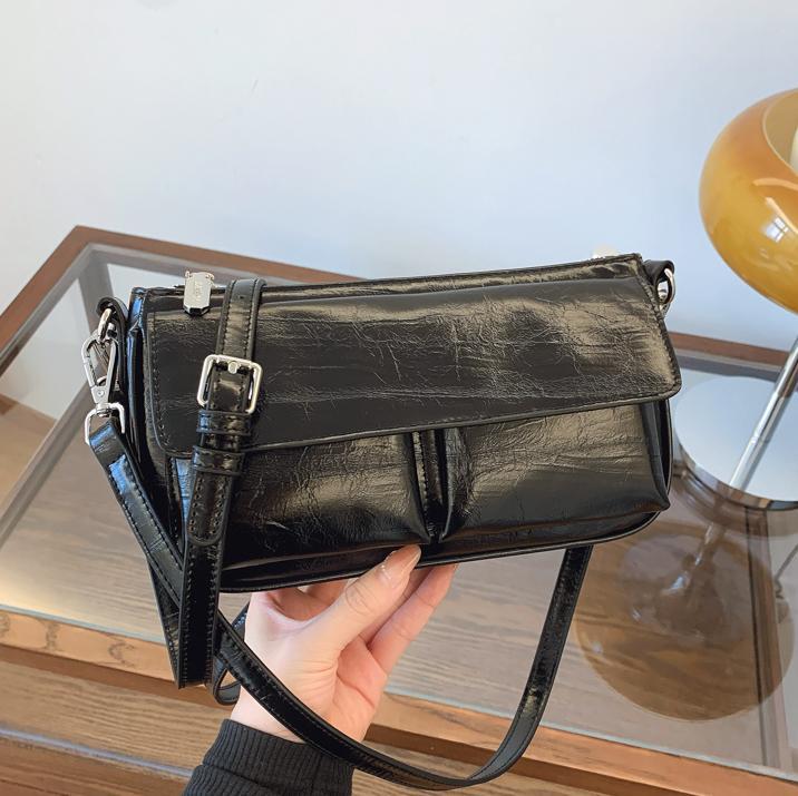 Retro versátil bolso de mujer 2025 nueva moda simple bolso de hombro casual nicho bolso de diseño de moda