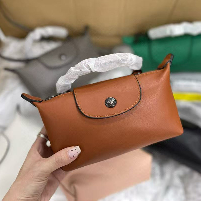 フランスの新しいスタイルのショートハンドルミニラムスキン餃子バッグ多用途ファッショナブルなワンショルダークロスボディクラッチバッグミニ携帯電話バッグ|undefined