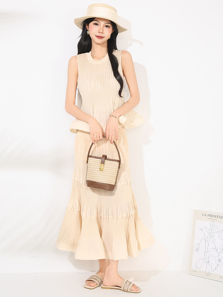 女性の夏のツーピーススーツホット販売新デザインつまようじプリーツノースリーブベストトップハイウエストスカートスーツ