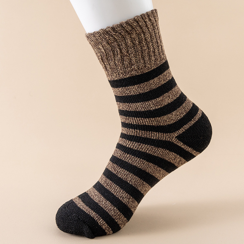 Calcetines de anillo para hombres de otoño y invierno más terciopelo grueso calcetines de piso de color sólido paralelo calcetines de toalla al por mayor transfronterizos