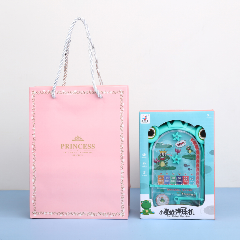 Small green pinball machine, fuchsia bag