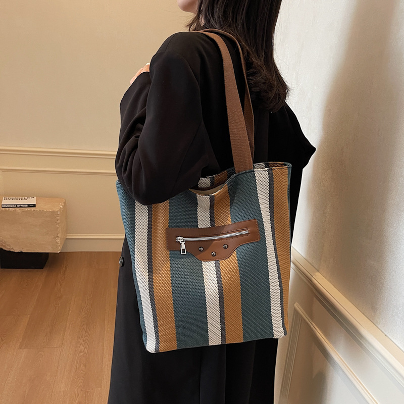 Nuevo bolso de alta gama para mujer bolso de gran capacidad bolso de hombro a rayas de todo fósforo de moda bolso de viaje de moda coreana