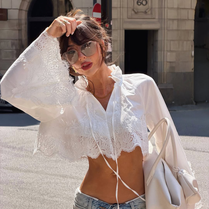 European and American cross-border hollow lace short cotton blouse for women with tie collar, bell sleeves, exposed waist, holiday style, French style European and American cross-border hollow lace short cotton blouse for women with tie collar, bell sleeves, exposed waist, holiday style, French style