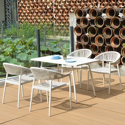 Mesa y silla al aire libre de tela de caña combinación de patio de hotel terraza jardín balcón café tela de caña mesa y silla de lujo al aire libre