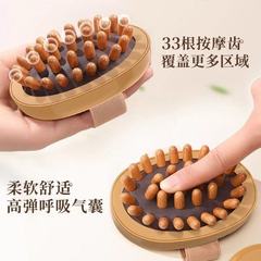 経絡ブラシは全身通用でお腹をこすって腰の腹の肝胆の筋を揉みます。