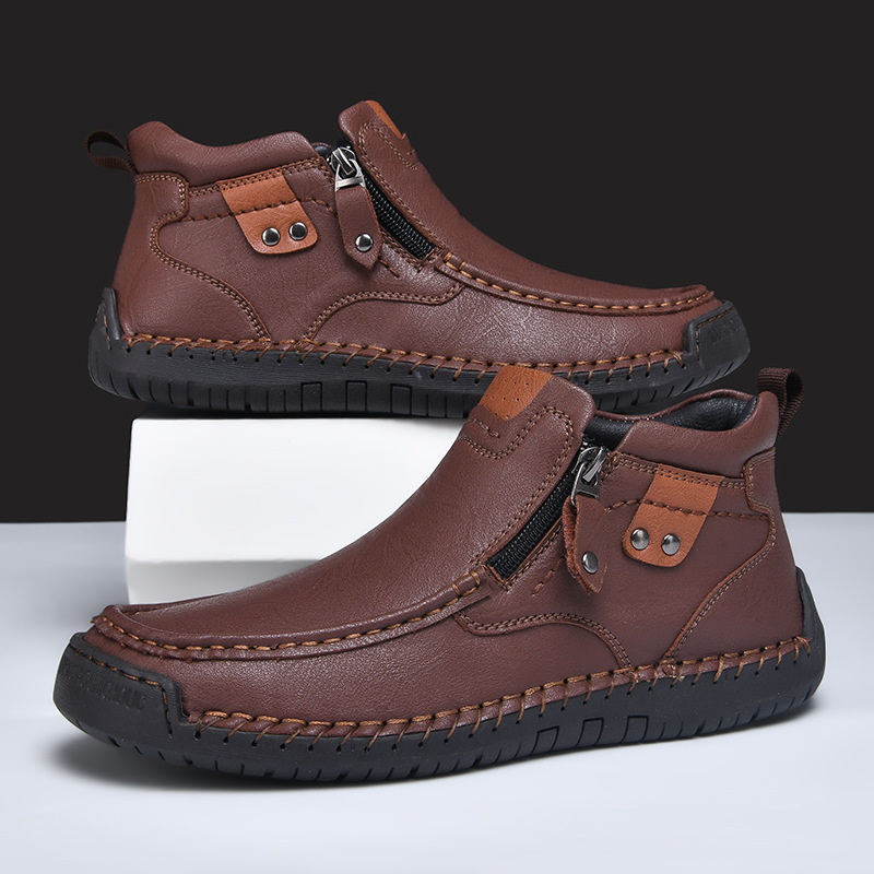 Nuevos zapatos casuales de hombre con cremallera lateral, botas cortas de moda, zapatos al aire libre de tamaño grande, invierno de comercio exterior transfronterizo 2025.