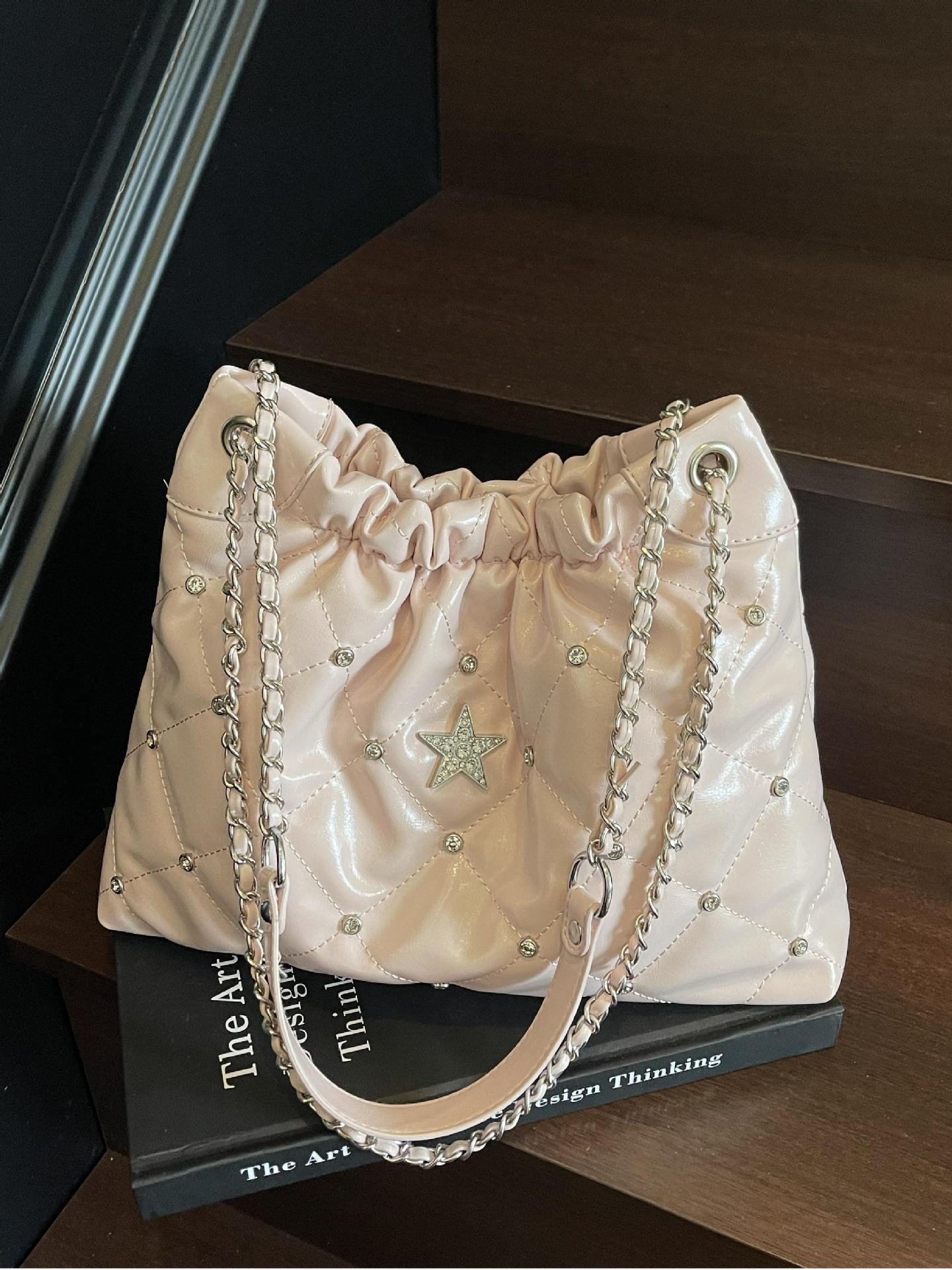 Venta caliente transfronteriza bolso de cubo de cadena de diamantes para mujer 2025 nuevo bolso de hombro casual de todo fósforo bolso de alta capacidad