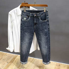 牛仔裤男2022年秋冬新款潮牌宽松哈伦裤子修身弹力小直筒牛仔裤男