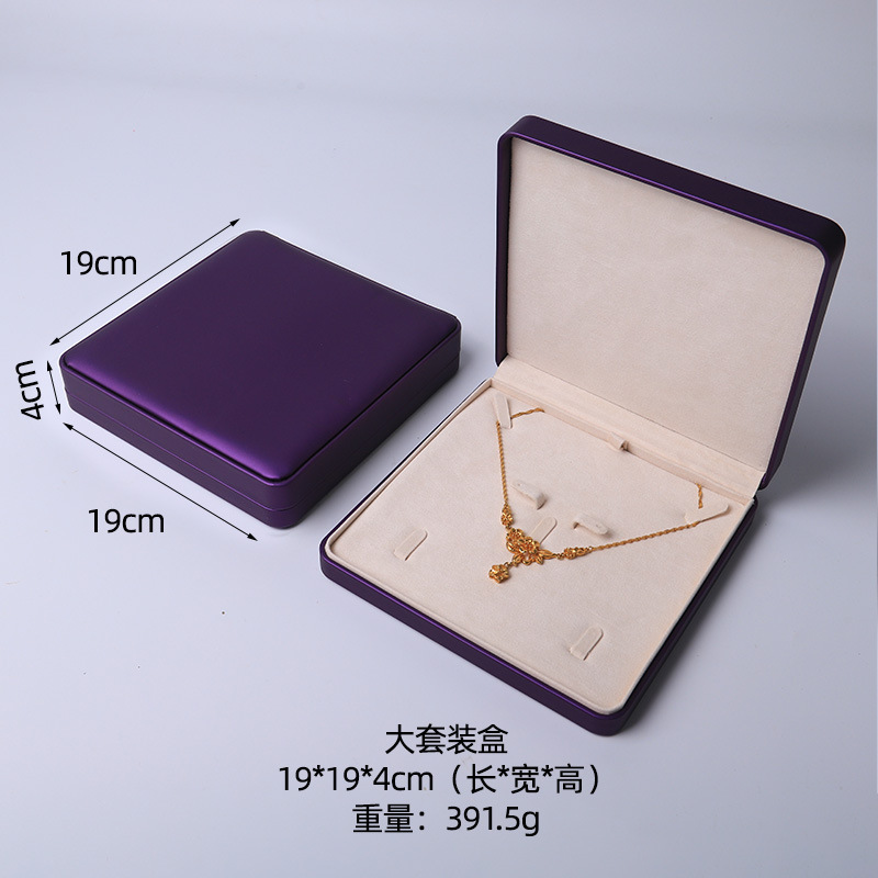 Caja de joyería rosa de alta calidad de cuero pu caja de embalaje de marca de joyería logotipo colgante pulsera collar caja de anillo