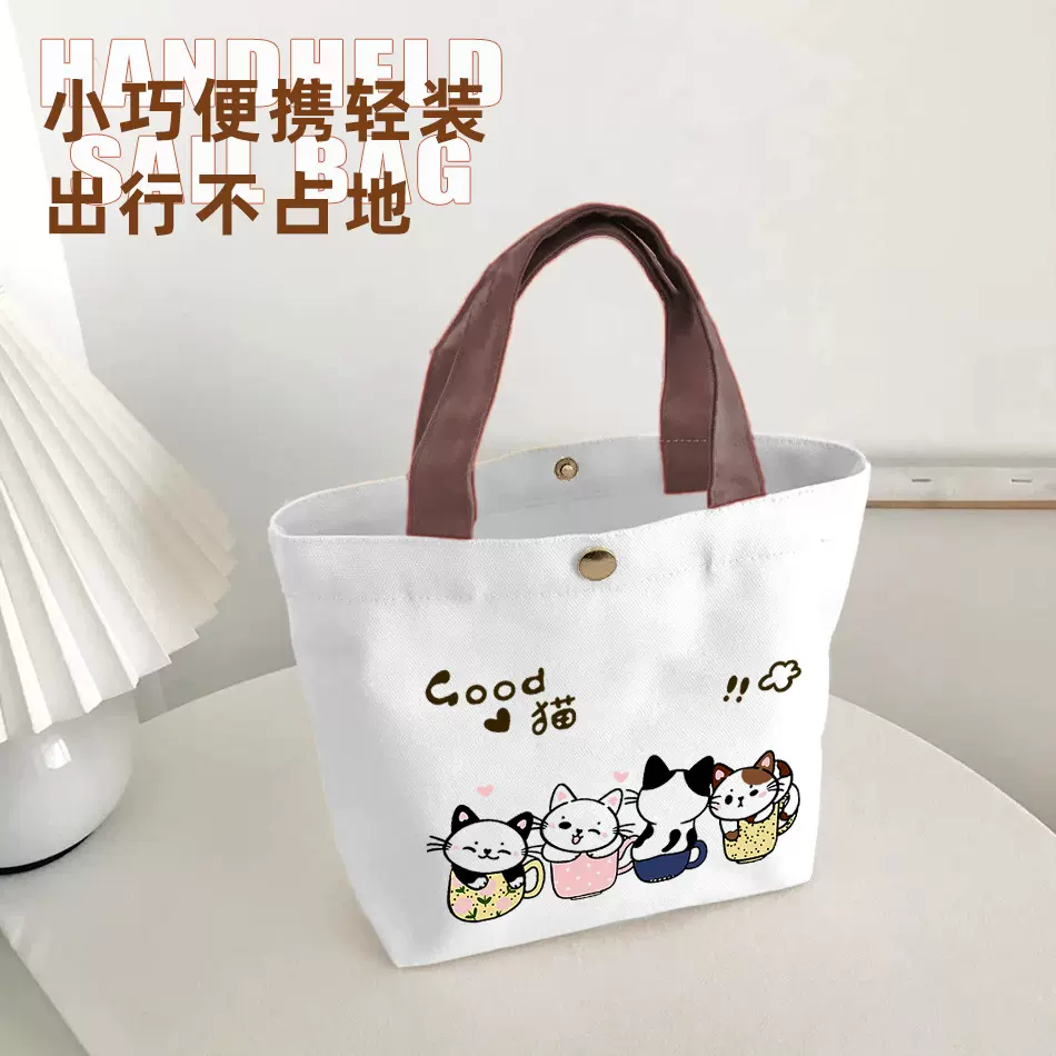 卡通原创日韩帆布包女小众上班杂物手拎包简约学生通勤饭盒包