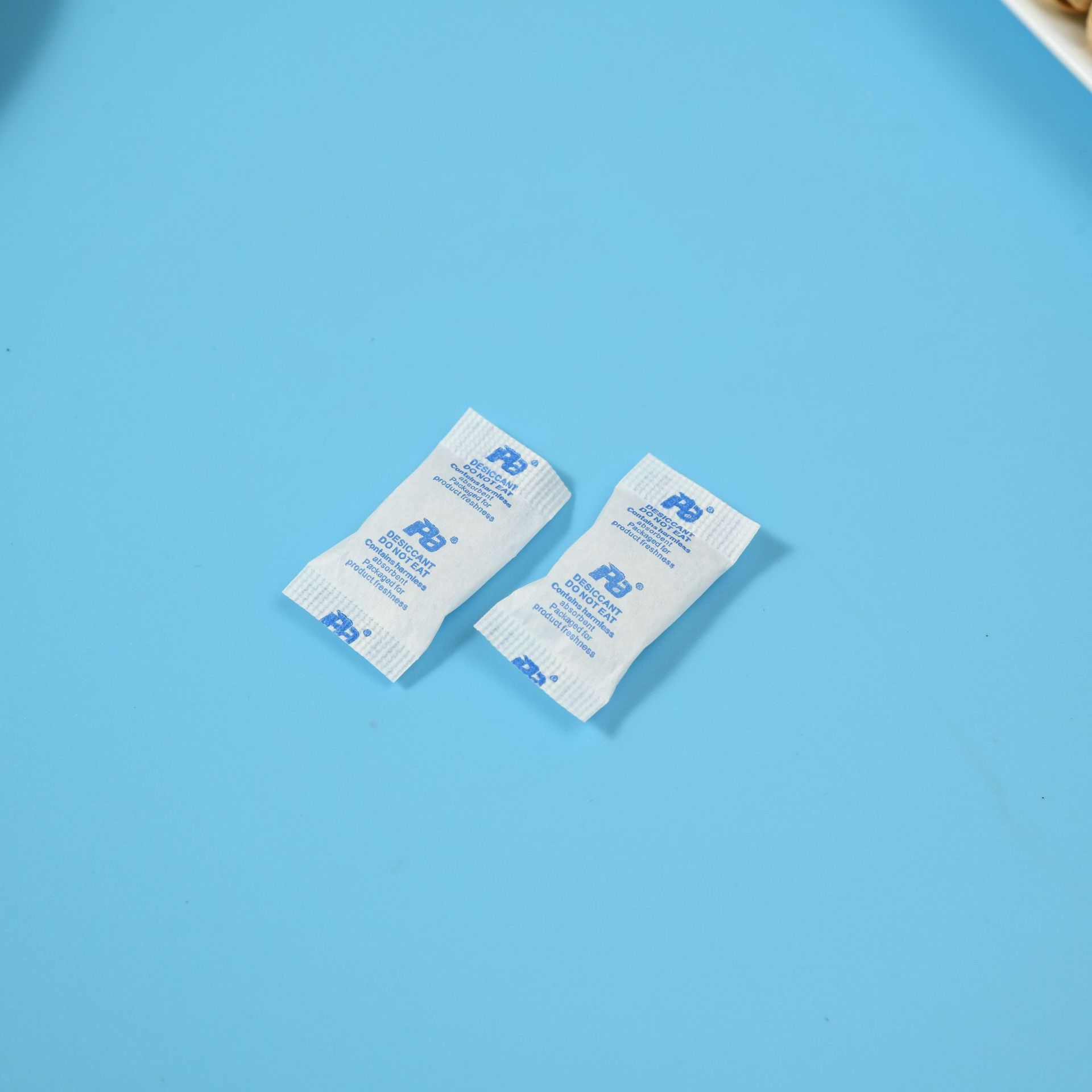 Agente desecante de gel de sílice medicinal a prueba de humedad para cápsulas de productos médicos y de salud del fabricante Chengfeng, de 1 a 100 g, papel de seda para cápsulas, gel de sílice antimoho.