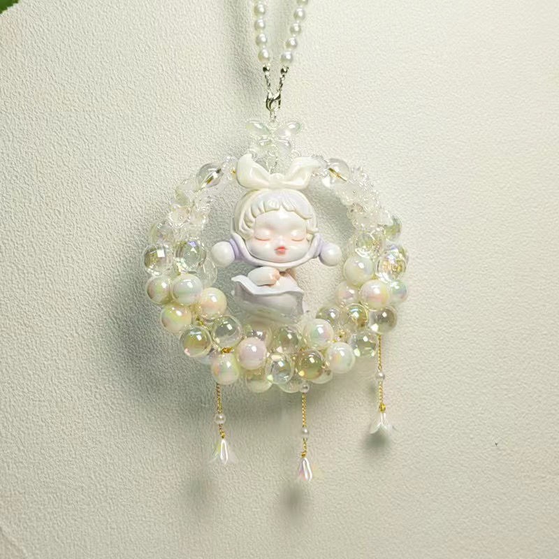 아기를 둘러싸는 고품질의 구슬이 가득한 원형(자신감)