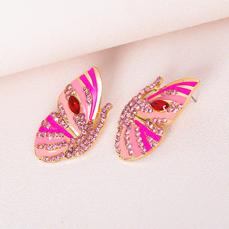 Neue Ohrringe Legierung Tropfende Diamant Strass Schmetterling Ohrringe display picture 9