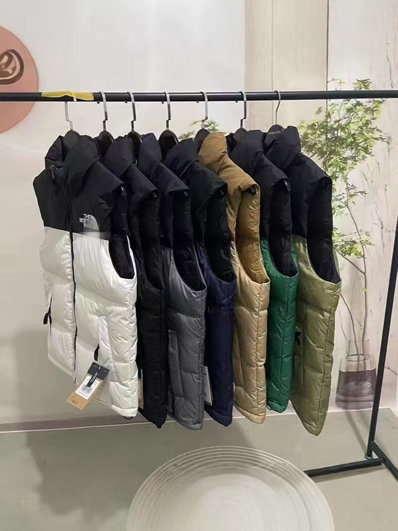 El mismo chaleco de algodón de cuello alto de la familia del norte, las mujeres se mantienen calientes en otoño e invierno, abrigos sin mangas, moda y chalecos de hombro de pareja. image 1