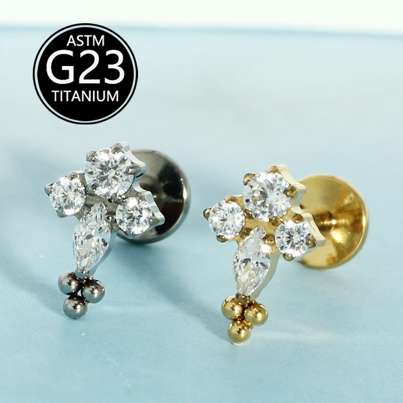 Silver pointed spike labret stud material detail