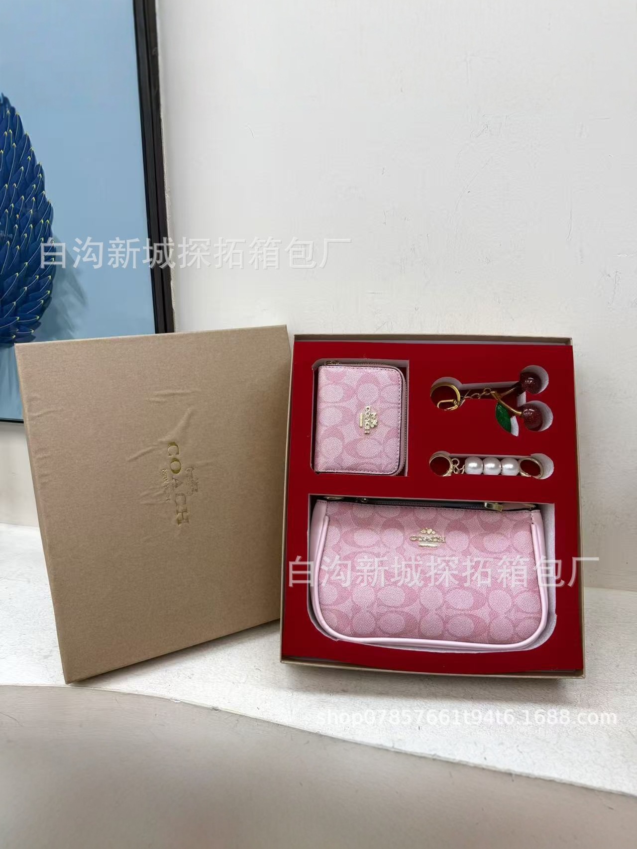 Transfronterizo paquete de bolsas de mano de damas 2025 nueva moda impresa bolsa de cambio llaveros caja de regalo universal