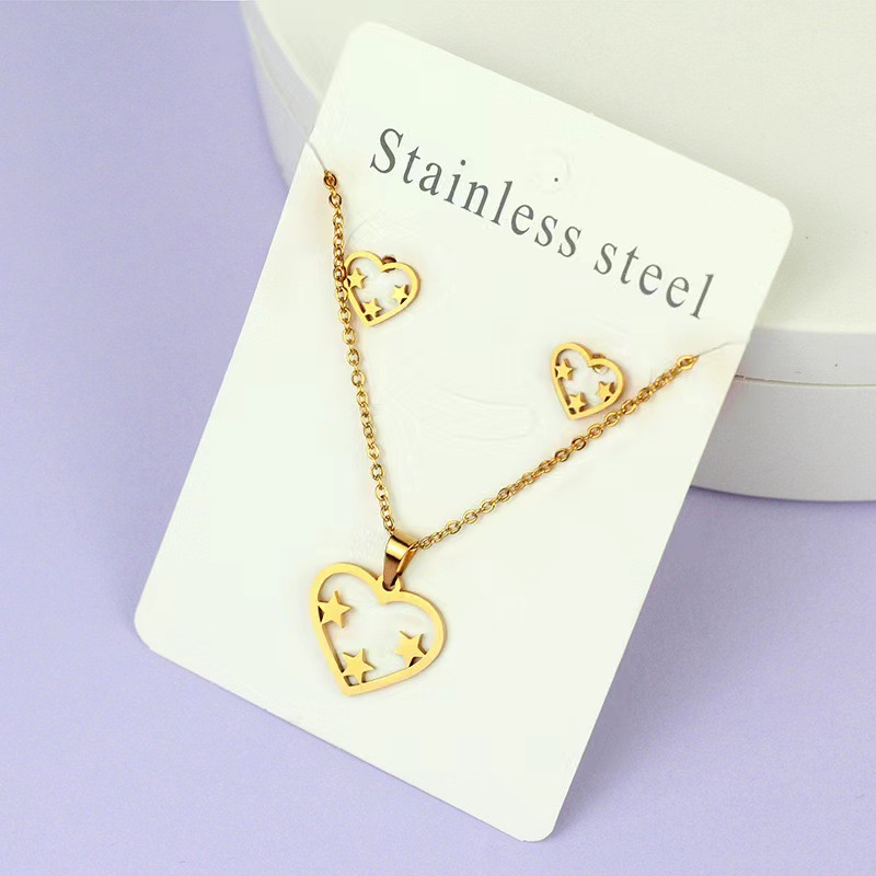 Net Red Butterfly Love Cross Personalidad Simple Juego de joyas de acero inoxidable Pendientes de oro Juego de collar al por mayor