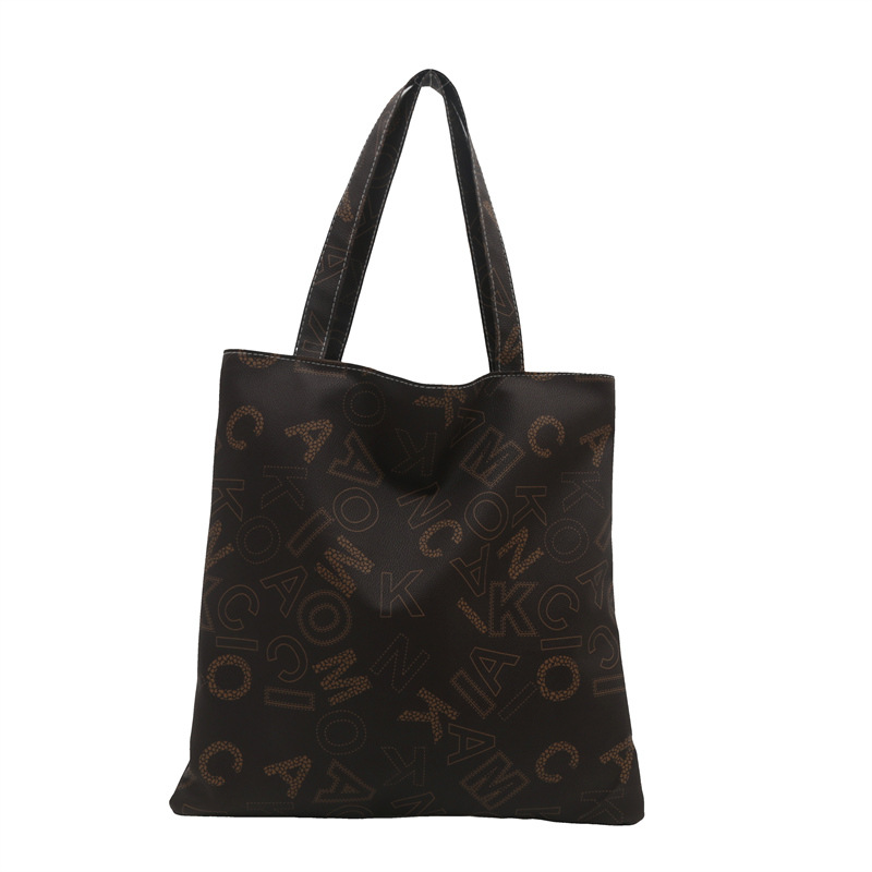 Otoño y invierno retro gran capacidad 2024 nuevo bolso de mujer bolso de hombro universal bolso de viaje de alta calidad bolso especial