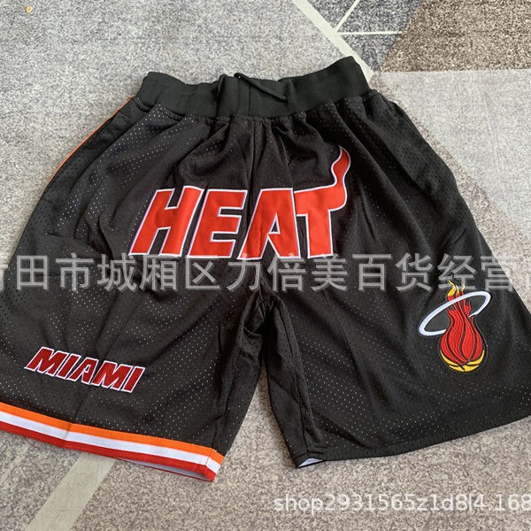 Comercio exterior pantalones de fútbol al por mayor Warriors Lakers 76 caliente Raptor mágico bolsillo bordado pantalones cortos pantalones de baloncesto NFL