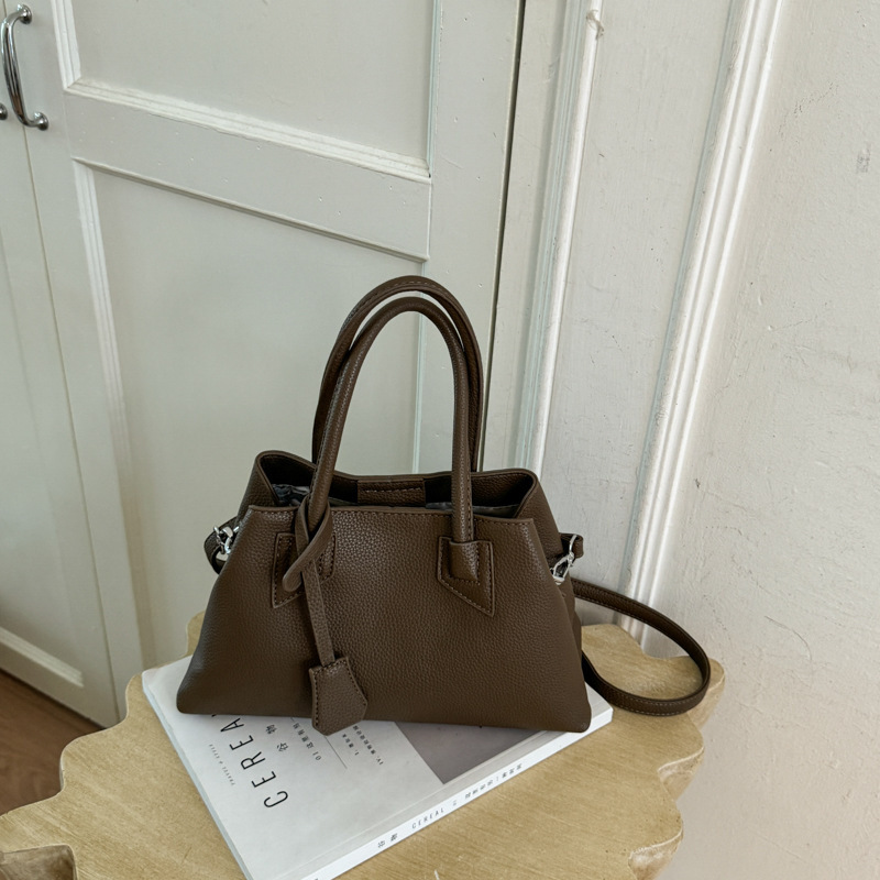Korean-style minimalist Boston pillow bag, versatile handbag and shoulder bag, women's bag for workplace and commuting, available for wholesale from the factory Korean-style minimalist Boston pillow bag, versatile handbag and shoulder bag, women's bag for workplace and commuting, available for wholesale from the factory