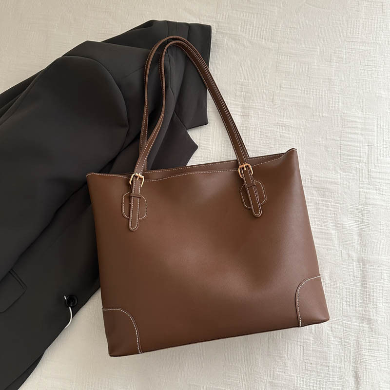 Alta sensación de gran capacidad bolso de mano 2024 otoño y invierno nuevo estilo versátil bolso de hombro de viaje al trabajo bolso especial