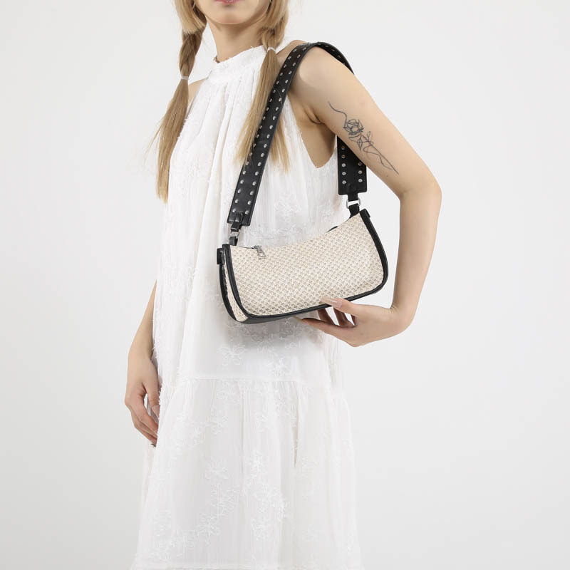 Bolsa trenzada debajo de la axila damas 2024 nuevo estilo ligero de lujo nicho de alta sensación de verano de vacaciones en la playa pastoral bolsa de paja