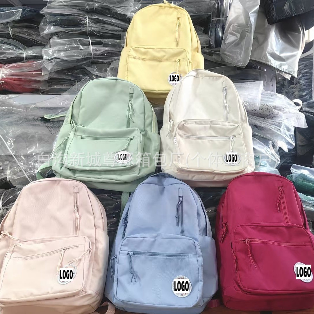 2025新款匡学生书包创意时尚户外运动双肩包简约时尚大容量背包女