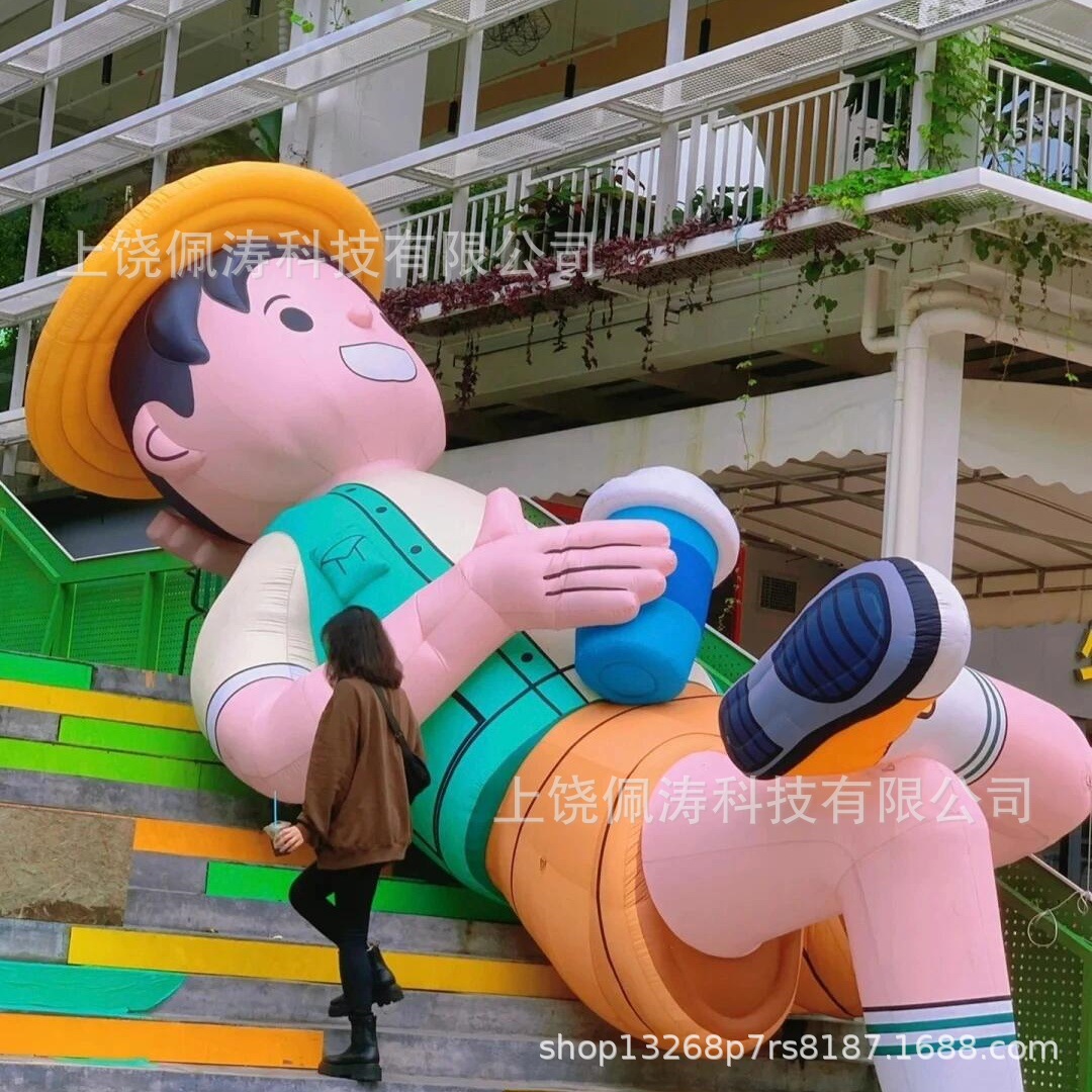 2025景区公园露营地活动装置引流打卡道具充气卡通躺姿男孩气模