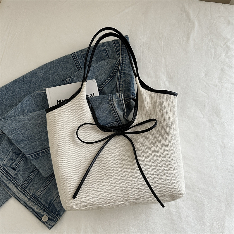Bolsa de algodón y lino a rayas de gran capacidad para mujeres 2024 nueva bolsa de hombro universal de estilo extranjero