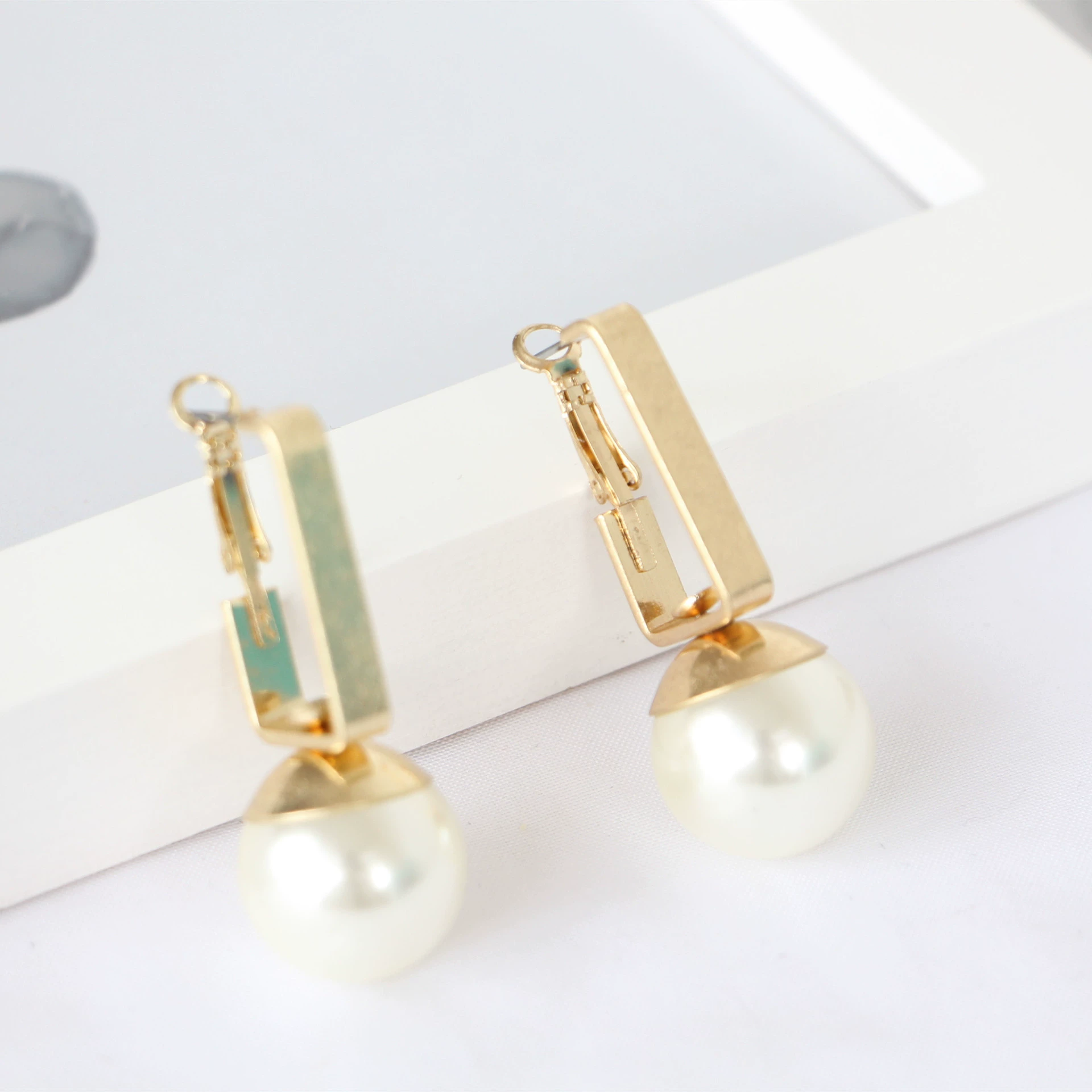 Design earrings from pearl, accessory, trend of season, wholesale