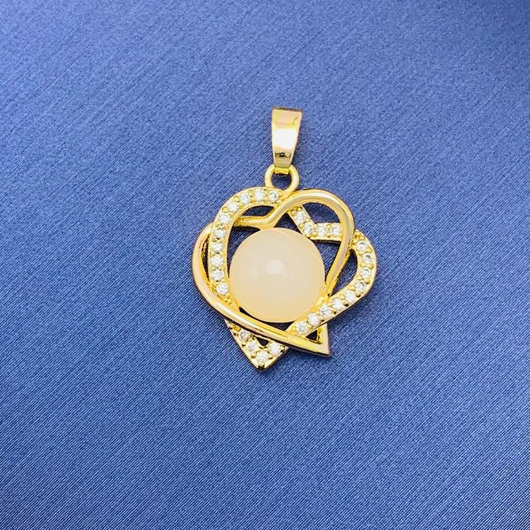 2022 nuevo trébol giratorio simple cien colgante fuente joyería fábrica al por mayor directa sin cadena