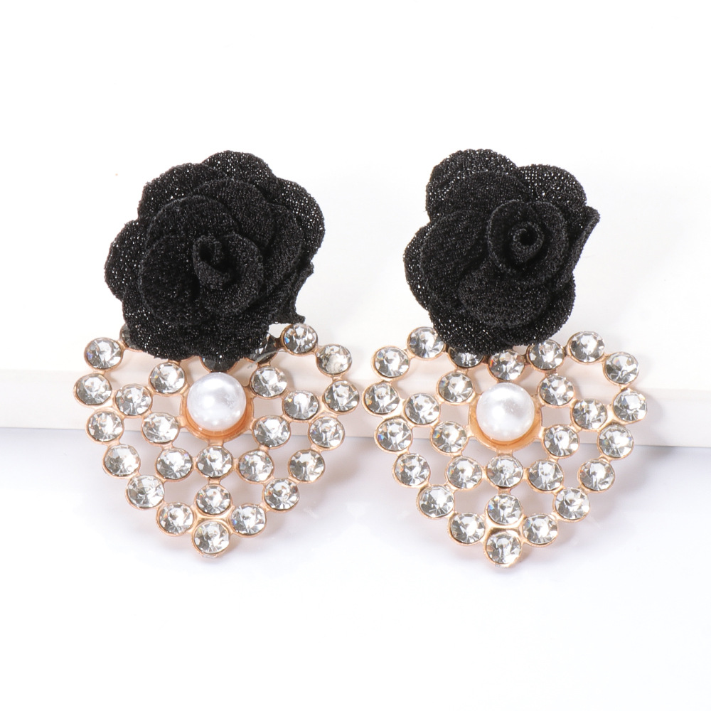 Fashion Geometric Heart-shaped Inlaid Rhinestone Flower Earrings display picture 10
