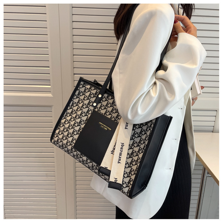 2023 New Hot Selling Large Capacity Bag Women's Versatile Commuting Shoulder Bag Fashionable and High Quality Retro Handheld Tote Bag_voghion.com
