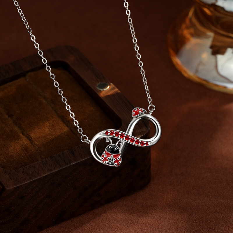 S925 plata de ley, símbolo infinito, collar de mariquita, lujo ligero femenino, nicho, sentido de alta gama, cadena de clavícula de comercio exterior de Amazon europea y americana