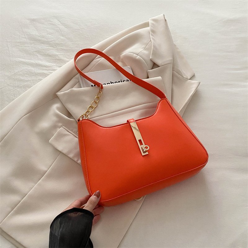 Bolso de alta sensación 2024, nuevo bolso de moda, primavera y verano, simple y versátil bolso de hombro de transporte, bolso de nicho de textura bajo la axila