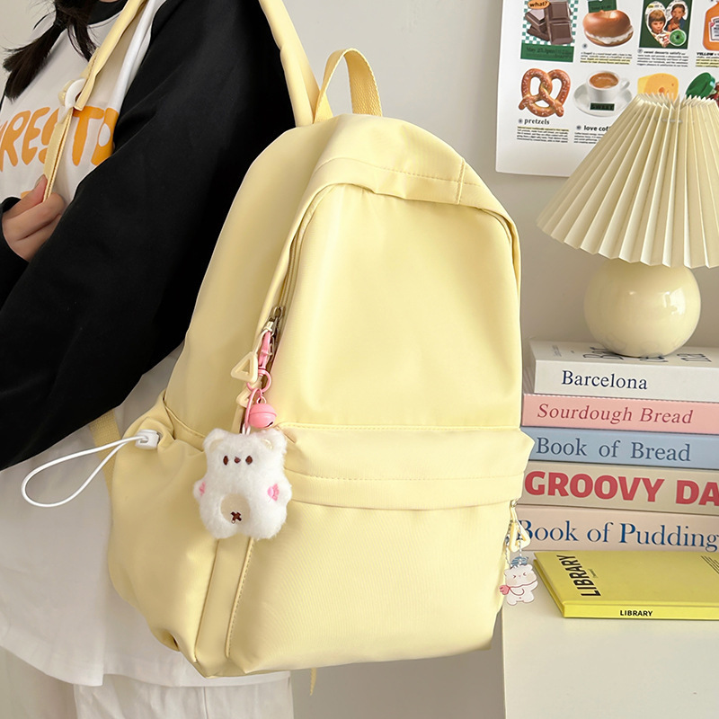 Mochila de gran capacidad para estudiantes de secundaria femenina simple y versátil para estudiantes de secundaria japonesa mochila de diseño